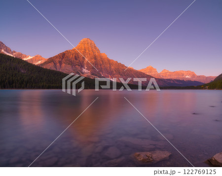 Mountains at dawn. Reflections on the surface of the water. Nature. Lake and rocks Mountains at dawn. Reflections on the surface of the water. Nature. Lake and rocks 122769125