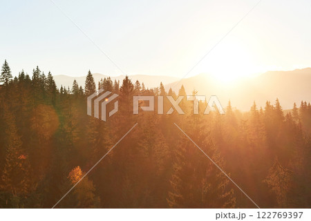Beautiful autumn morning on the view point above the deep forest valley in Carpathians, Ukraine, Europe Beautiful autumn morning on the view point above the deep forest valley in Carpathians, Ukraine, Europe 122769397