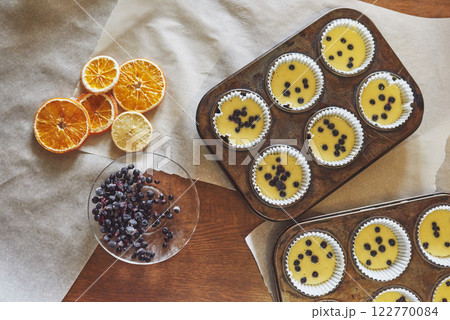 Making muffins and molding in molds 122770084