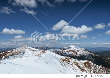 Mysterious winter landscape majestic mountains in winter. Winter road in the mountains. In anticipation of the holiday. Dramatic wintry scene. Carpathian 122770222