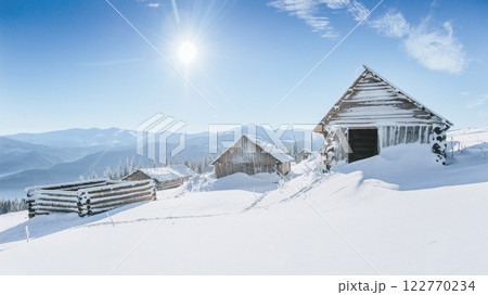 Mysterious winter landscape majestic mountains in winter. Magical winter snow covered tree. Winter road in the mountains. In anticipation of the holiday. Dramatic wintry scene. Carpathian. Ukraine 122770234