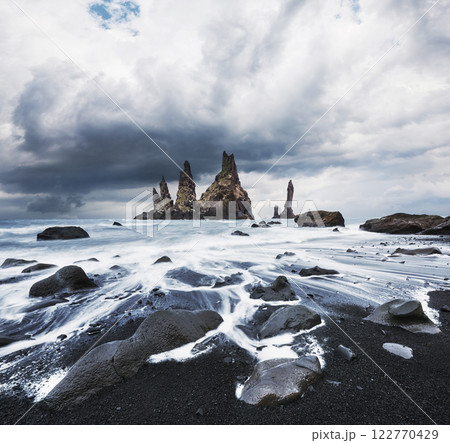 Iceland, Jokulsarlon lagoon, Beautiful cold landscape picture of icelandic glacier lagoon bay, The Rock Troll Toes. Reynisdrangar cliffs. Iceland, Jokulsarlon lagoon, Beautiful cold landscape picture of icelandic glacier lagoon bay, The Rock Troll Toes. Reynisdrangar cliffs. 122770429