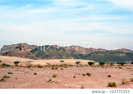 Colorful mountains in Timna Park in the Arava desert Colorful mountains in Timna Park in the Arava desert 122772352
