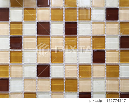The wall or the floor are decorated with colorful of tiles. 122774347