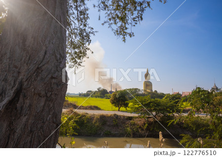 Wat Muang is an old temple in Ang Thong Province. The large Buddha statue was built in 2008. It is the largest in Thailand and is a landmark where you must come to worship and ask for blessings Wat Muang is an old temple in Ang Thong Province. The large Buddha statue was built in 2008. It is the largest in Thailand and is a landmark where you must come to worship and ask for blessings 122776510