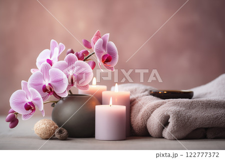 Beautiful spa composition. Couple Towels With Candles And Orchid For Natural Massage 122777372
