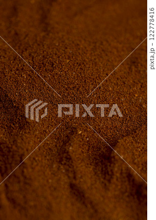 a large amount of ground coffee powder a large amount of ground coffee powder 122778416