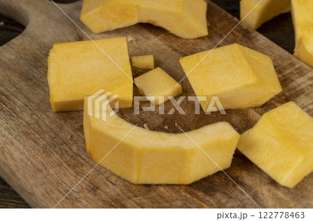 orange pumpkin fruit details cut into pieces for cooking orange pumpkin fruit details cut into pieces for cooking 122778463