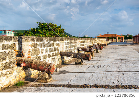Old cannons on historic defensive wall surrounding the center of Cartagena, Colombia, South America 122780856