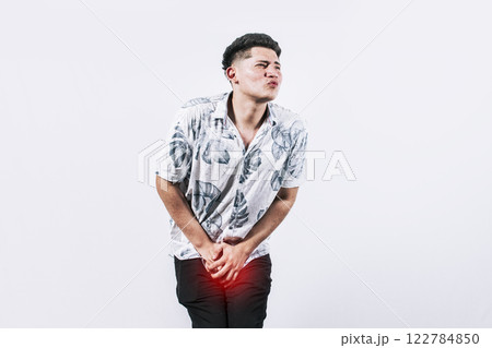 Medical problem, urinary incontinence concept. young man with crotch pain, man with diarrhea problem 122784850