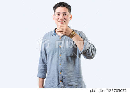 Person gesturing DRINK in sign language. Deaf and dumb person showing DRINK in sign language. Young man gesturing DRINK in sign language isolated 122785071