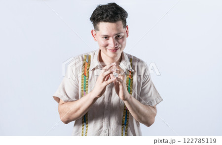 Cunning man rubbing his hands on isolated background, person rubbing his hands planning something, concept of cunning man planning something 122785119