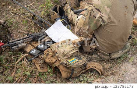 Team of U.S. Army marine corps soldier military war with gun weapon participating and preparing to attack the enemy in Thailand during exercise Cobra Gold training in battle. Combat force. 122785178