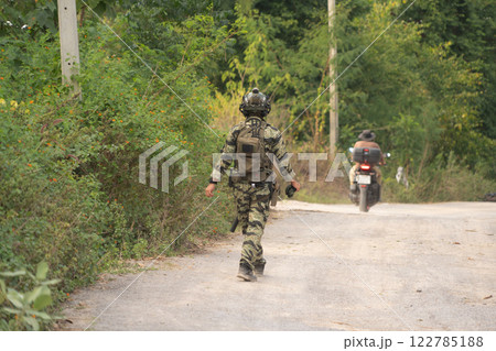 Team of U.S. Army marine corps soldier military war with gun weapon participating and preparing to attack the enemy in Thailand during exercise Cobra Gold training in battle. Combat force. 122785188