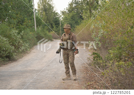 Team of U.S. Army marine corps soldier military war with gun weapon participating and preparing to attack the enemy in Thailand during exercise Cobra Gold training in battle. Combat force. 122785201