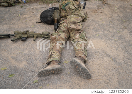 Team of U.S. Army marine corps soldier military war with gun weapon participating and preparing to attack the enemy in Thailand during exercise Cobra Gold training in battle. Combat force. 122785206