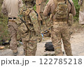 Team of U.S. Army marine corps soldier military war with gun weapon participating and preparing to attack the enemy in Thailand during exercise Cobra Gold training in battle. Combat force. 122785218