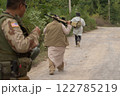 Team of U.S. Army marine corps soldier military war with gun weapon participating and preparing to attack the enemy in Thailand during exercise Cobra Gold training in battle. Combat force. 122785219