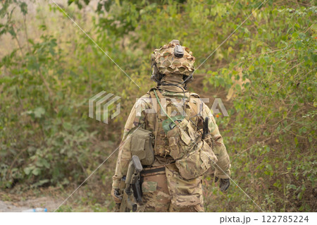 Team of U.S. Army marine corps soldier military war with gun weapon participating and preparing to attack the enemy in Thailand during exercise Cobra Gold training in battle. Combat force. 122785224