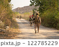 Team of U.S. Army marine corps soldier military war with gun weapon participating and preparing to attack the enemy in Thailand during exercise Cobra Gold training in battle. Combat force. 122785229