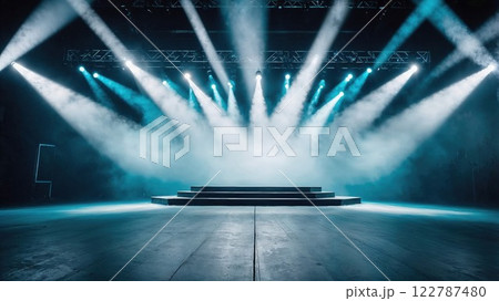 Dramatic stage illuminated by powerful beams of blue and white lights, creating an atmospheric scene perfect for performances, concerts, or theatrical productions Dramatic stage illuminated by powerful beams of blue and white lights, creating an atmospheric scene perfect for performances, concerts, or theatrical productions 122787480