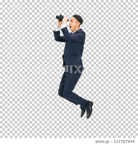 Middle-aged male business person jumping with binoculars. Full-body photo PNG with transparent background precisely cut out by hand. 122787844