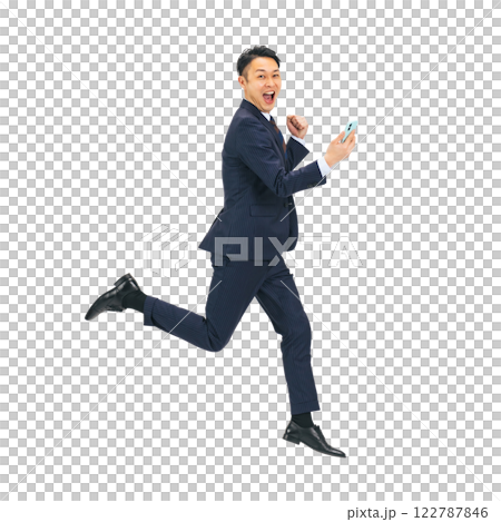 Middle-aged male businessman jumping while looking at his smartphone. Full-body photo PNG with transparent background precisely cut out by hand 122787846