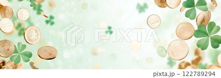 St. Patricks Day clovers and gold coins on green glitter background 122789294