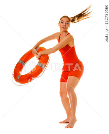 Lifeguard on duty with ring buoy lifebuoy. 122789566