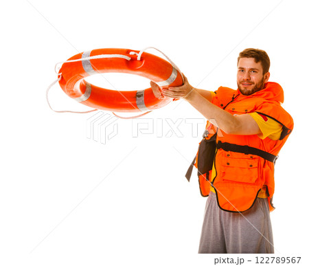 Lifeguard in life vest with ring buoy lifebuoy. 122789567