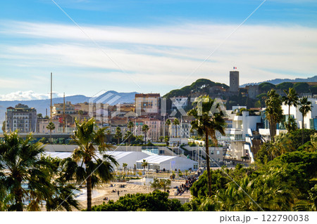 Cannes beach and castle, buildings and palm trees, France 122790038