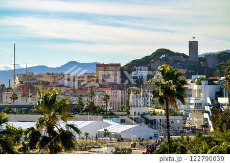 Cannes beach and castle, buildings and palm trees, France 122790039