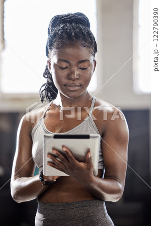 Personal trainer with digital tablet, mobile wellness technology in gym and black woman exercise in fitness gym. Sports athlete online, workout coach and internet training motivation 122790390