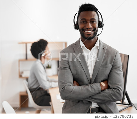 Call center, customer service and crm consultant wearing headset and looking happy in telemarketing company. Portrait of confident black man in contact us and sales support department for assistance Call center, customer service and crm consultant wearing headset and looking happy in telemarketing company. Portrait of confident black man in contact us and sales support department for assistance 122790735