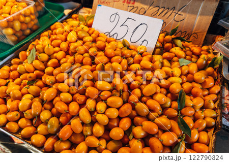 Bunch of fresh kumquats fruits in the organic food market 122790824
