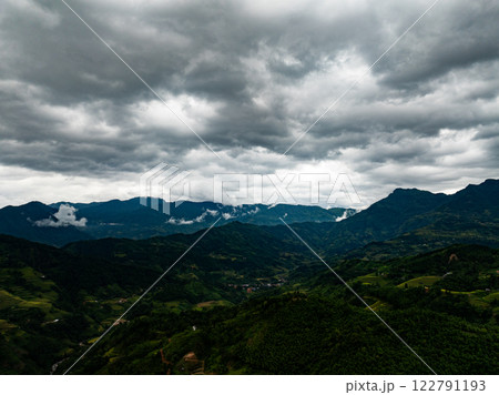 Drone aerial view of landscape mountains view in sunset or sunrise time,High angle view image over countryside at northern Vietnam Drone aerial view of landscape mountains view in sunset or sunrise time,High angle view image over countryside at northern Vietnam 122791193