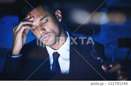 Night, stress and headache of a businessman working overtime or late in dark office for 404 report, IT coding or software deadline. Tired, frustrated or sad corporate information technology manager Night, stress and headache of a businessman working overtime or late in dark office for 404 report, IT coding or software deadline. Tired, frustrated or sad corporate information technology manager 122791248