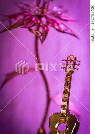 Gold figurine guitar Gold figurine guitar 122792580