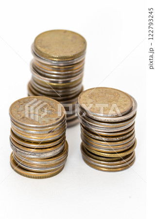 Stacks of coins 122793245