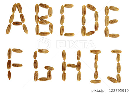 Alphabet of date fruit seeds. 122795919