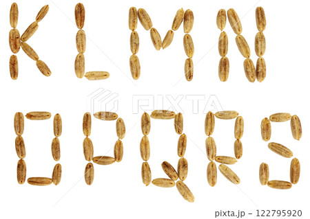 Alphabet of date fruit seeds. Alphabet of date fruit seeds. 122795920
