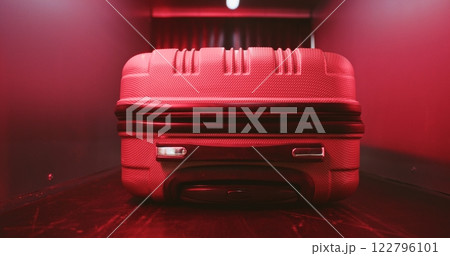 Red Light Alert About Detected Suspicious Item During Luggage Scanning Procedure in X-ray Scanner Red Light Alert About Detected Suspicious Item During Luggage Scanning Procedure in X-ray Scanner 122796101