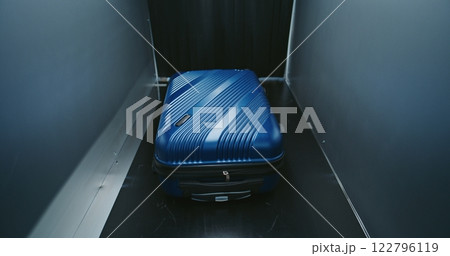 Security Checkpoint in Airport: Baggage Screening Procedure for Boarding Plane Flight 122796119