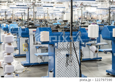 Textile Manufacturing Machines in Modern Factory Textile Manufacturing Machines in Modern Factory 122797590