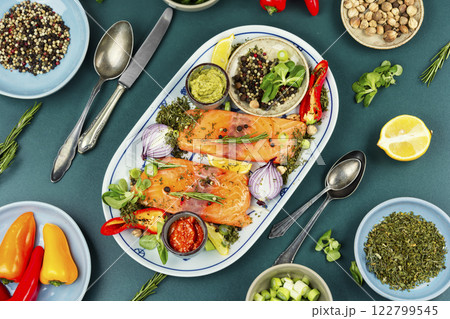 Raw salmon fish and spices. Raw salmon fish and spices. 122799545