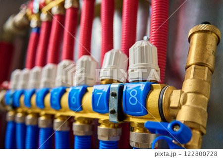 Underfloor heating manifold with valves and flow meters 122800728