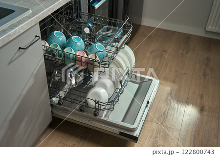 Open Dishwasher with Clean Plates and Cups Open Dishwasher with Clean Plates and Cups 122800743