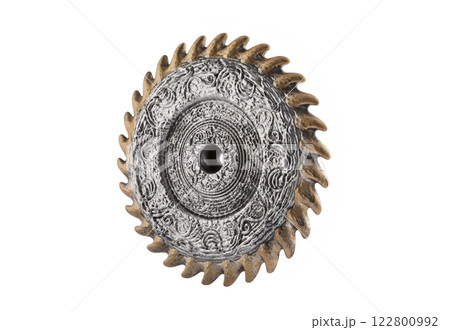 Old decorated metal saw blade isolated on white background with cliping path Old decorated metal saw blade isolated on white background with cliping path 122800992