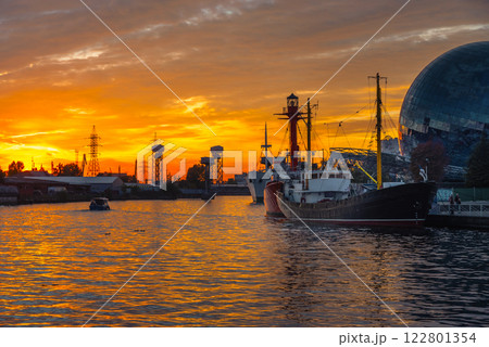 Pregolya River and ships in Kaliningrad at sunset. Russia 122801354