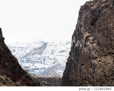 view snowy mountains through Garni Gorge, Armenia view snowy mountains through Garni Gorge, Armenia 122802860